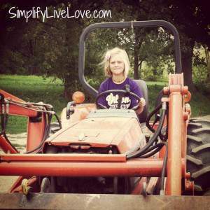 anna driving tractor